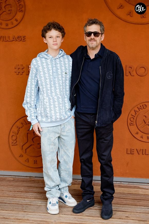 Guillaume Canet et son fils Marcel au village lors des Internationaux de France de Tennis de Roland Garros 2025, à Paris, France, le 8 juin 2025. © Cyril Moreau/Bestimage