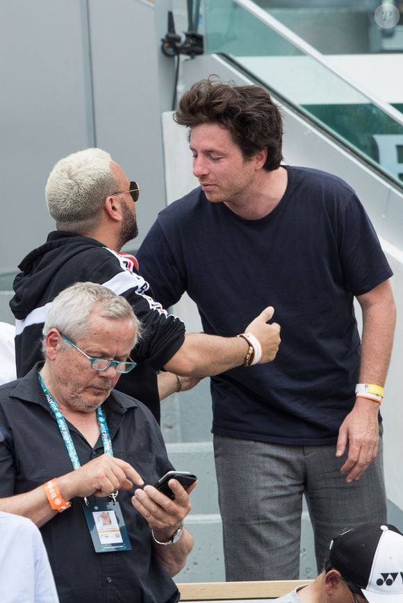 Cyril Hanouna et le chef Jean Imbert dans les tribunes lors des internationaux de tennis de Roland Garros à Paris, France, le 4 juin 2019. © Jacovides-Moreau/Bestimage