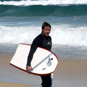 Archives - Christophe Dominici  a la plage le 1er octobre 2003 -  © FEP / Panoramic / Bestimage