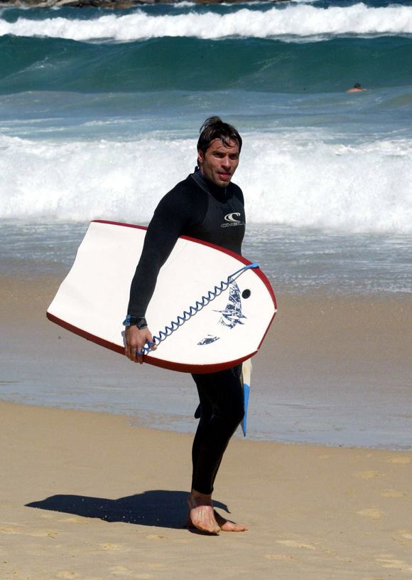 Archives - Christophe Dominici  a la plage le 1er octobre 2003 -  © FEP / Panoramic / Bestimage