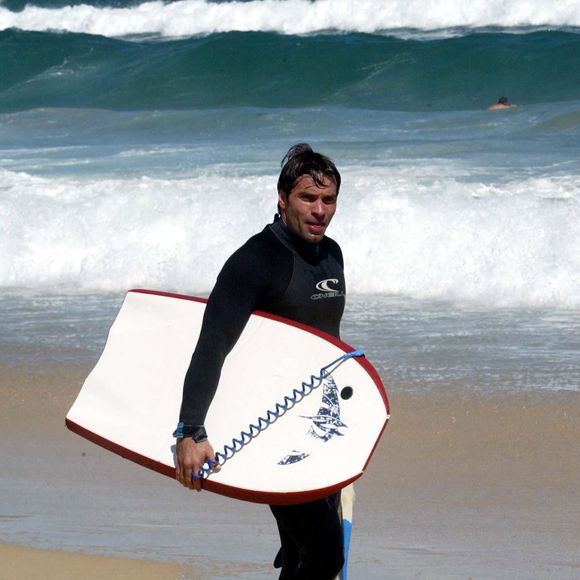 Archives - Christophe Dominici  a la plage le 1er octobre 2003 -  © FEP / Panoramic / Bestimage