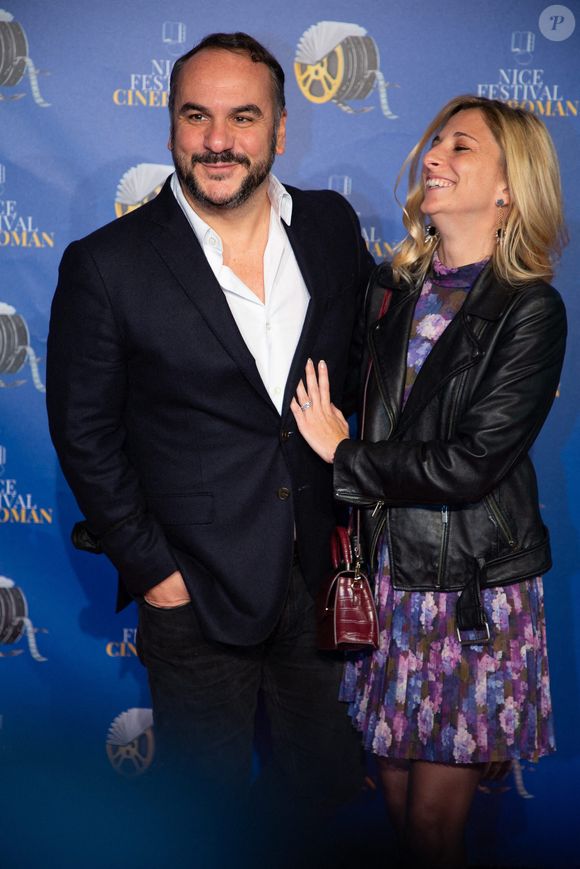 François-Xavier Demaison et sa femme Anaïs Tihay posant lors du photocall pour ''Lui'' lors du Festival Cineroman à Nice, France, le 23 octobre 2021. Photo by Lucie Choquet /ABACAPRESS.COM