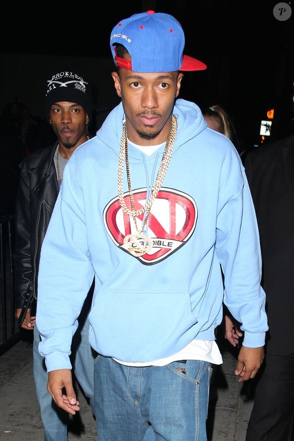 Nick Cannon arrive à DBA Hollywood pour son concert de DJ invité.  L'ancien mari de Mariah Carey était élégant dans un sweat à capuche Ncredible bleu bébé, une casquette latérale et des chaussures montantes assorties à Los Angeles, CA, USA, le 22 décembre 2014. Photo by GSI/ABACAPRESS.COM