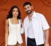 Ce dimanche, Cyril Benzaquen et son épouse Amel ont fait une apparition très remarquée dans les allées très prisées de Roland-Garros. 

Cyril Benzaquen et sa femme Amel - Les célébrités au photocall du village lors des Internationaux de France de Tennis de Roland Garros. © Jacovides / Bestimage