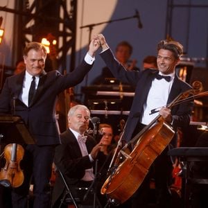 Renaud Capuçon, Gautier Capuçon - "Concert de Paris" sur le parvis de l'hôtel de ville de Paris retransmis en direct sur France 2 et sur France Inter, Paris le 14 juillet 2024. © Christophe Clovis - Pierre Perusseau / Bestimage