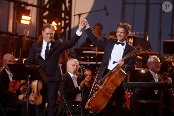 Renaud Capuçon, Gautier Capuçon - "Concert de Paris" sur le parvis de l'hôtel de ville de Paris retransmis en direct sur France 2 et sur France Inter, Paris le 14 juillet 2024. © Christophe Clovis - Pierre Perusseau / Bestimage