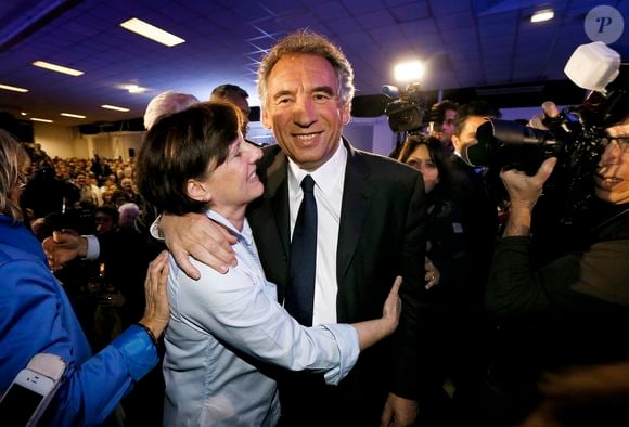 Président du Parti du Centre (MoDem) et candidat à la mairie de Pau, François Bayrou célèbre avec sa femme Elisabeth après avoir remporté le vote à l'issue du second tour des élections municipales françaises, à Pau, dans le sud-ouest de la France, le 30 mars 2014. Photo by Patrick Bernard/ABACAPRESS.COM