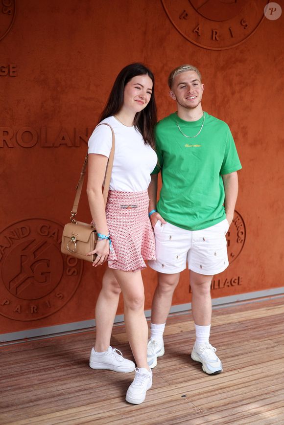 Michou et sa compagne Elsa Bois - Célébrités au Village lors des Internationaux de France de tennis de Roland Garros 2023 à Paris le 10 juin 2023. © Jacovides-Moreau/Bestimage
